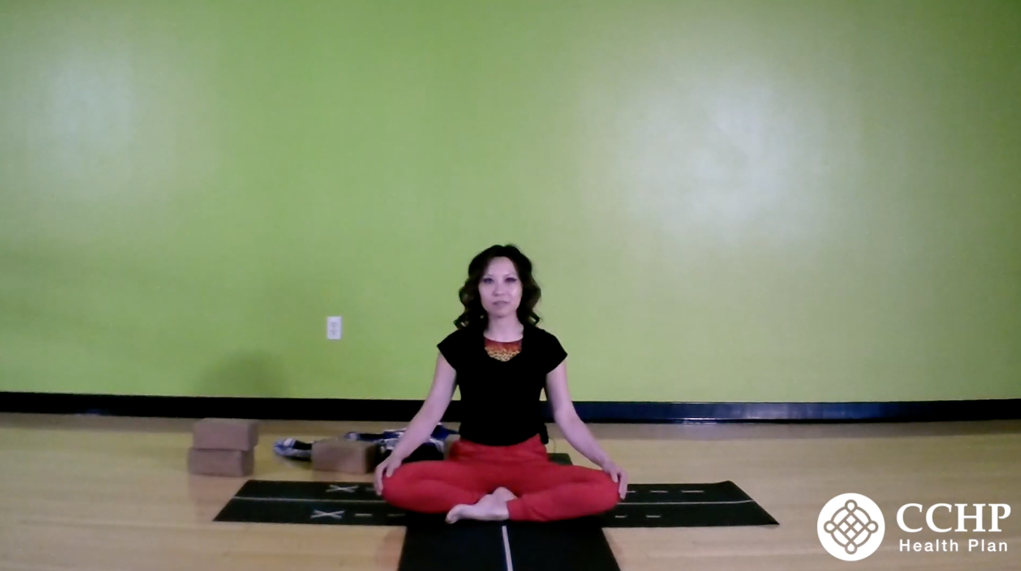 lady teaching yoga.
