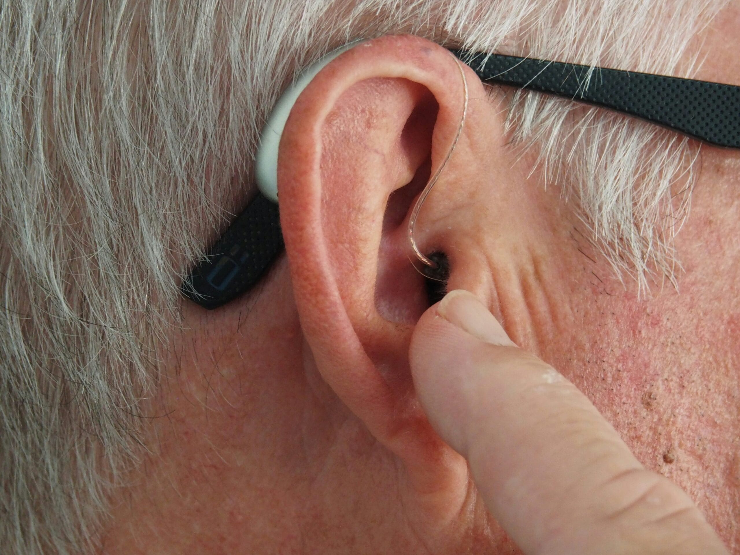 person with hearing aid